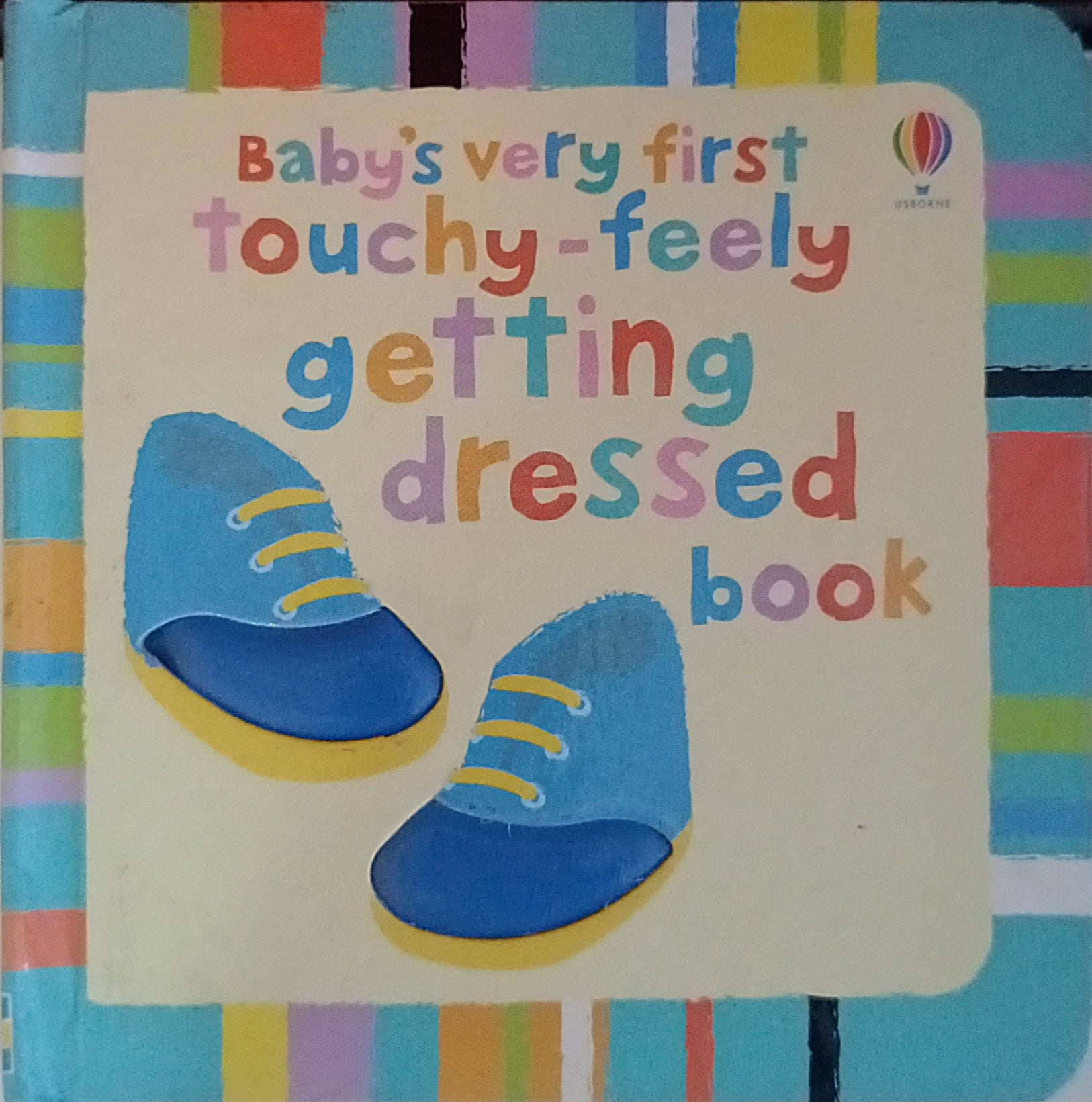 Baby's Very First Touchy Feely Getting Dressed Book